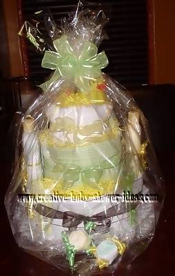 green and brown rubber ducky diaper cake