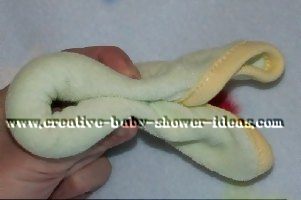 hold rolled washcloth together