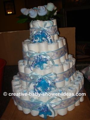 boy diaper cake with bows and sock roses