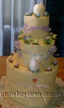 cream and lavendar towel cake